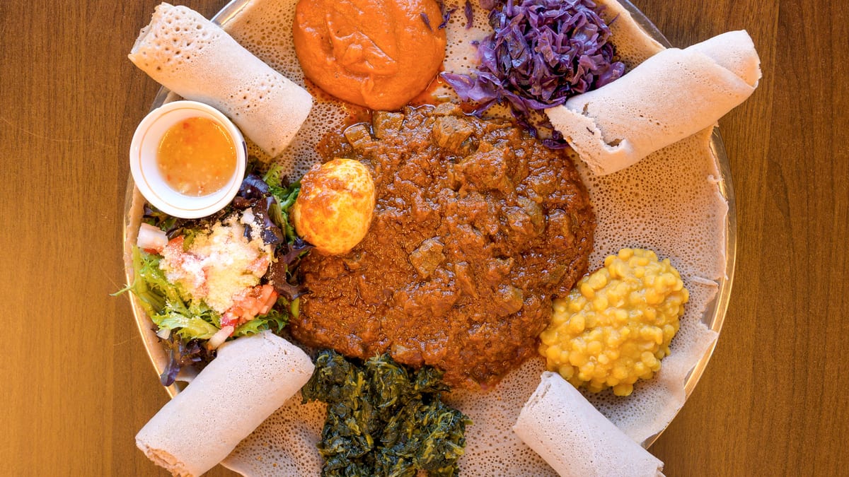 Injera, wats, and sambusa