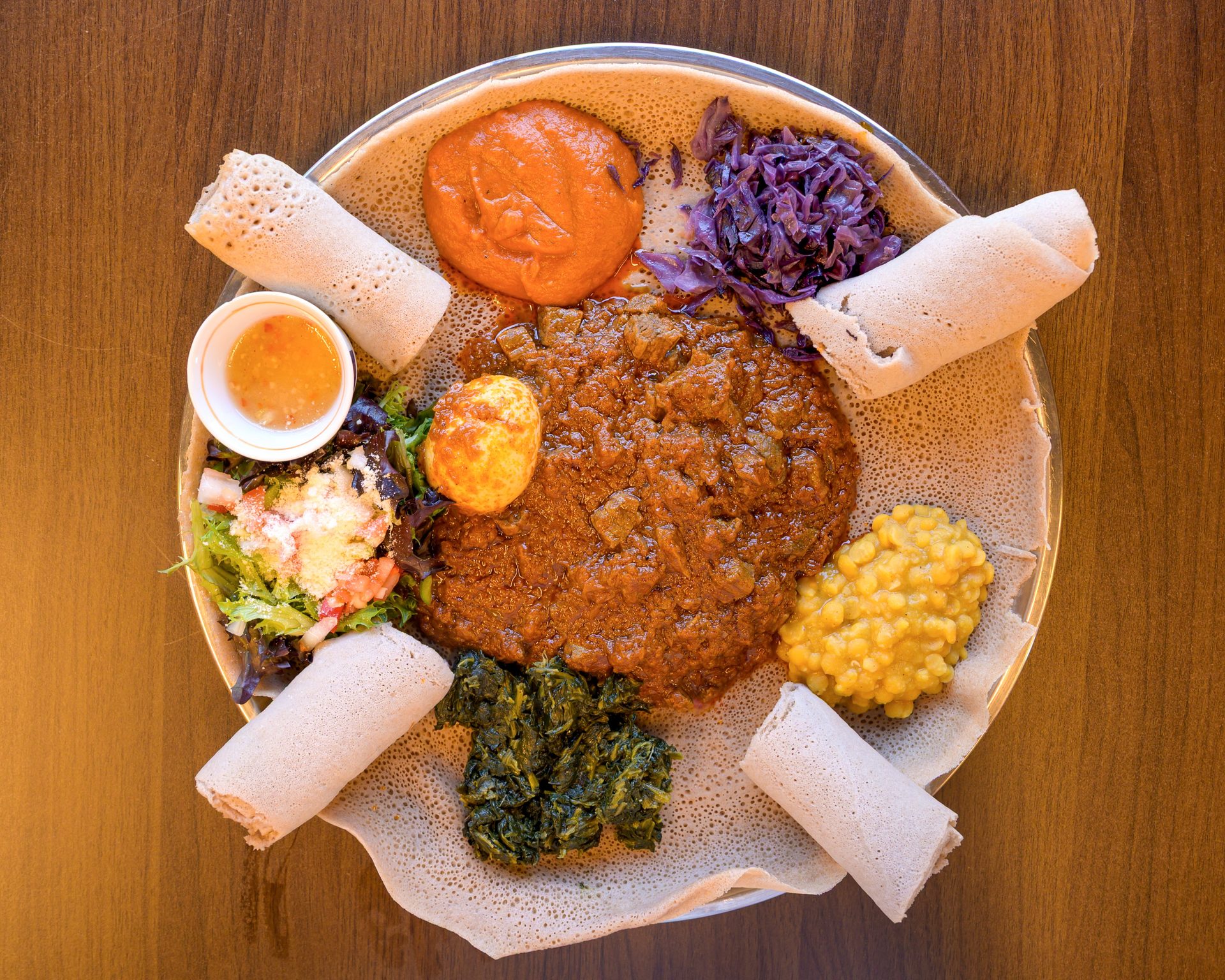 Injera, wats, and sambusa